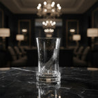Black tableware packaging with a glass product and 'Azad' branding.
